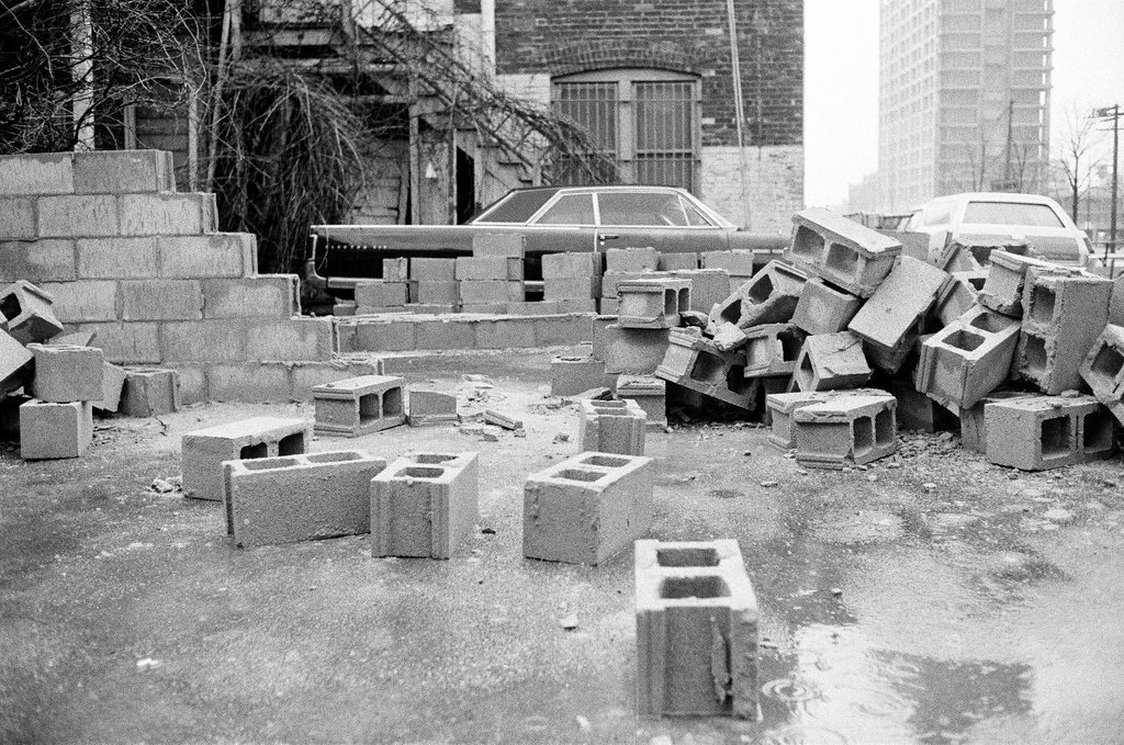 Scene where a car was blocked in by bricks - Jerry Tomaselli for Chicago Sun-Times