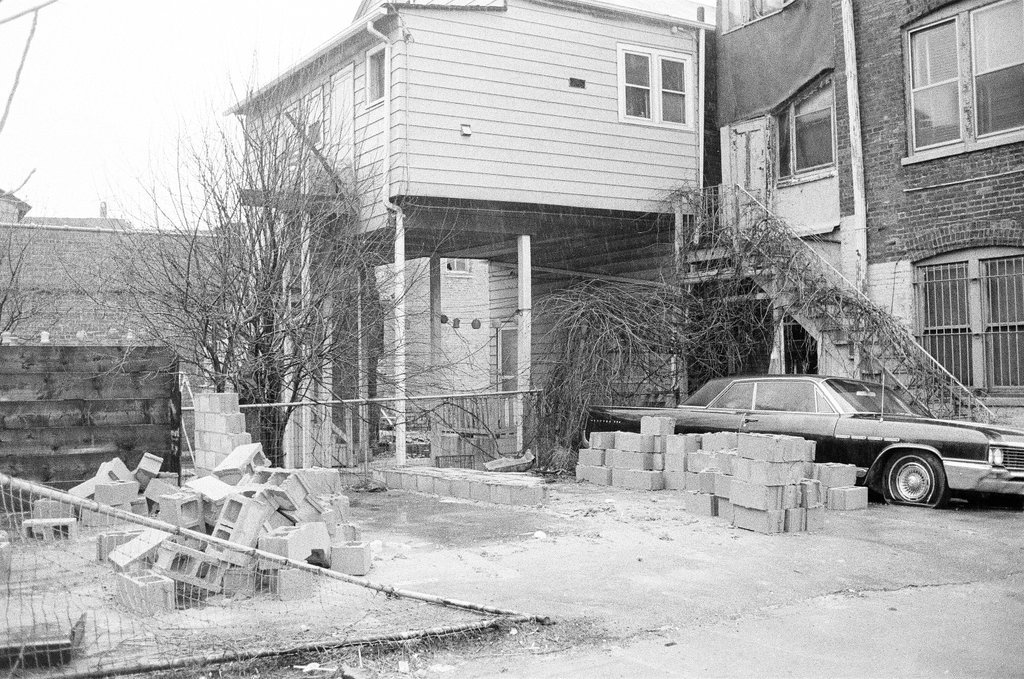 Scene where a car was blocked in by bricks - Jerry Tomaselli for Chicago Sun-Times
