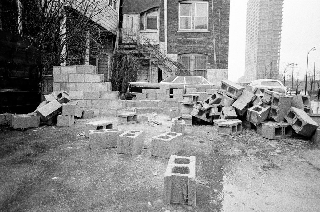 Scene where a car was blocked in by bricks - Jerry Tomaselli for Chicago Sun-Times