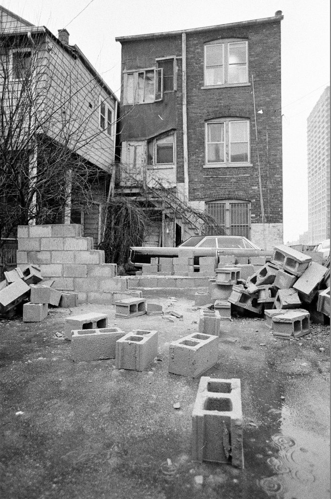 Scene where a car was blocked in by bricks - Jerry Tomaselli for Chicago Sun-Times