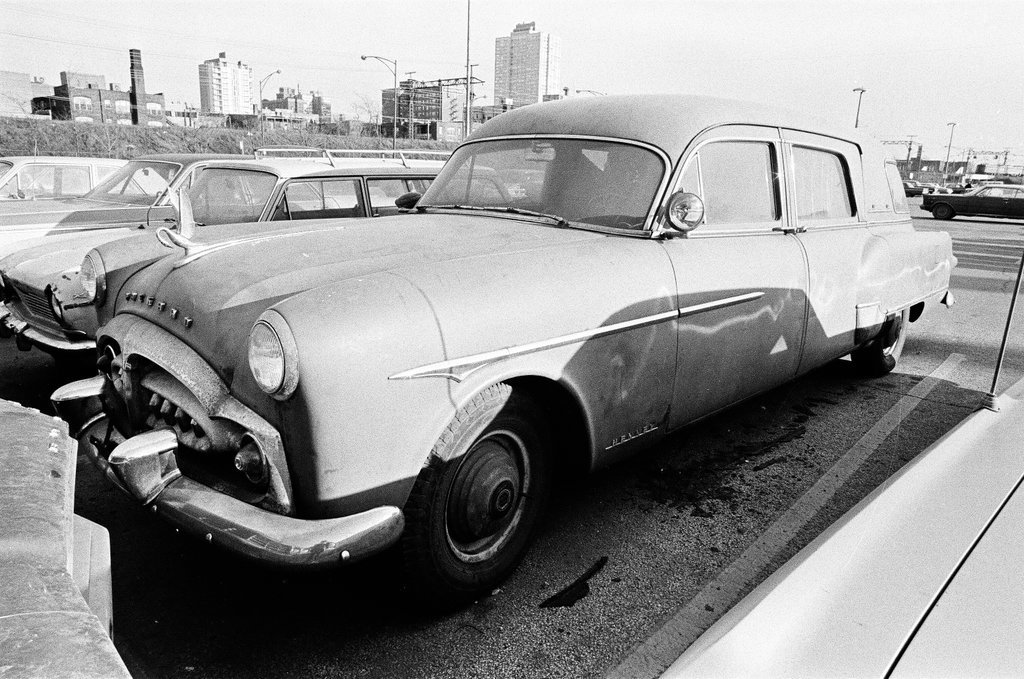Packard hearse abandoned in parking lot - Fred Stein for Chicago Daily News