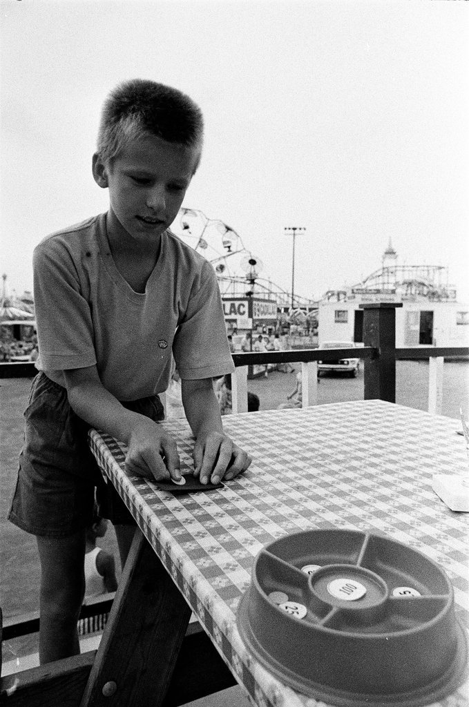 Tiddily Winks contest at Back of the Yards Family Fun Fair - Jack Lenahan for Chicago Sun-Times