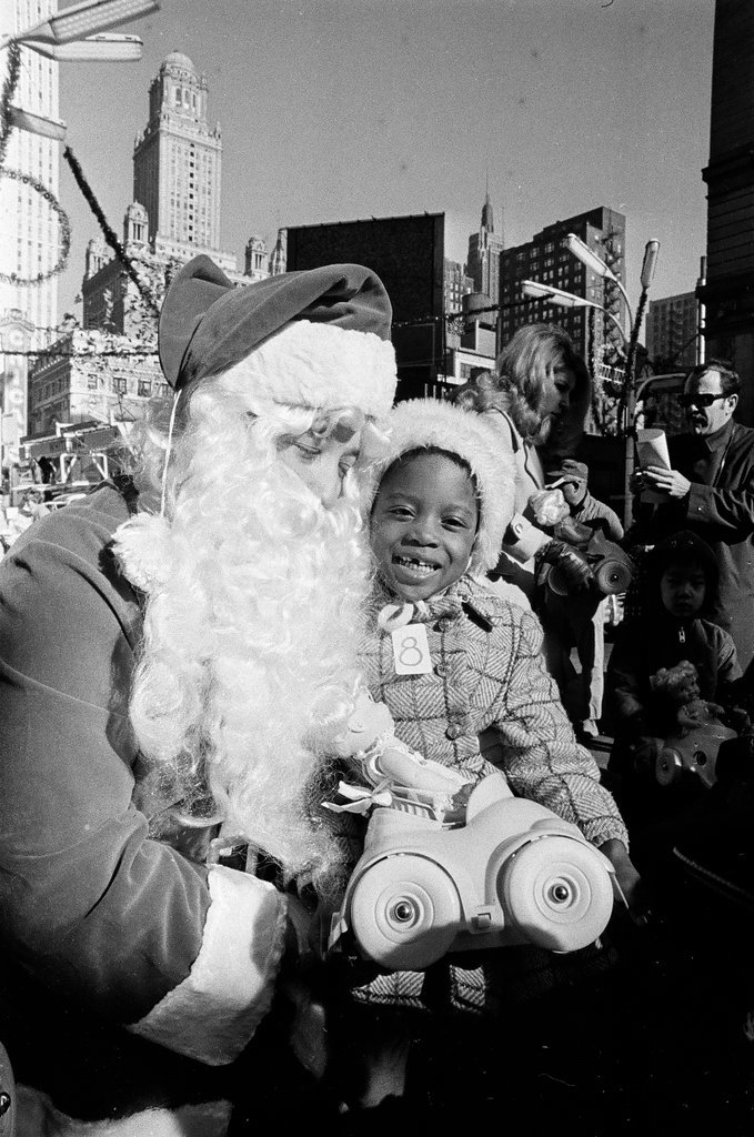 Monique Caldwell with Santa for Crusade of Mercy event - Charles Krejcsi for Chicago Sun-Times