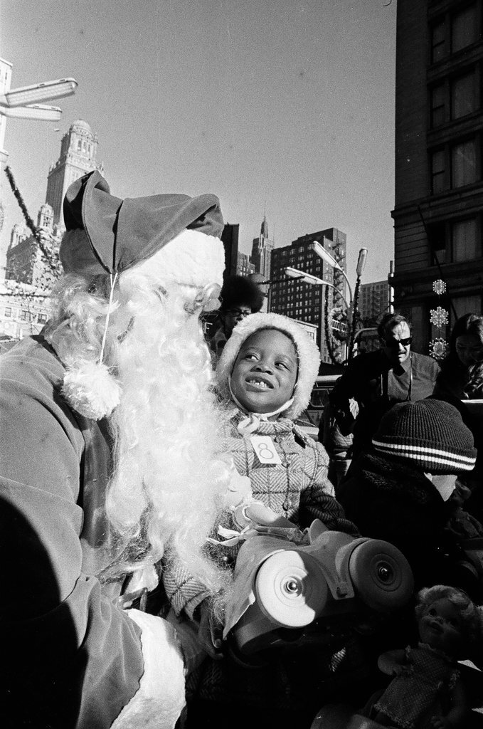 Monique Caldwell with Santa for Crusade of Mercy event - Charles Krejcsi for Chicago Sun-Times