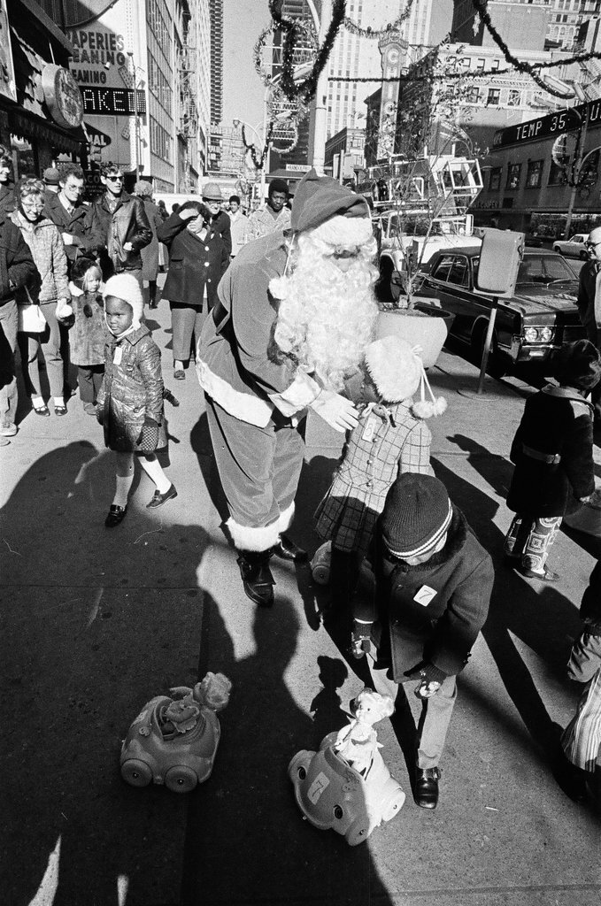 Monique Caldwell with Santa for Crusade of Mercy event - Charles Krejcsi for Chicago Sun-Times