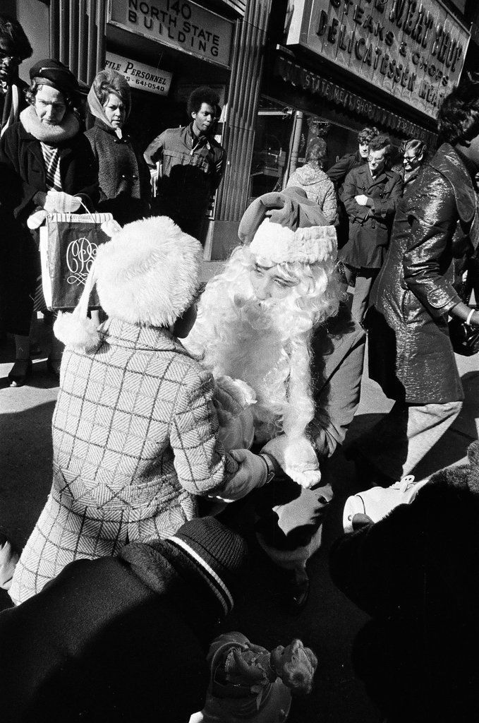 Monique Caldwell with Santa for Crusade of Mercy event - Charles Krejcsi for Chicago Sun-Times