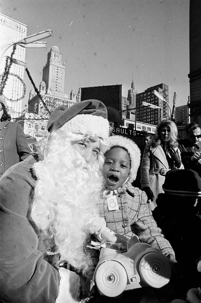 Monique Caldwell with Santa for Crusade of Mercy event - Charles Krejcsi for Chicago Sun-Times