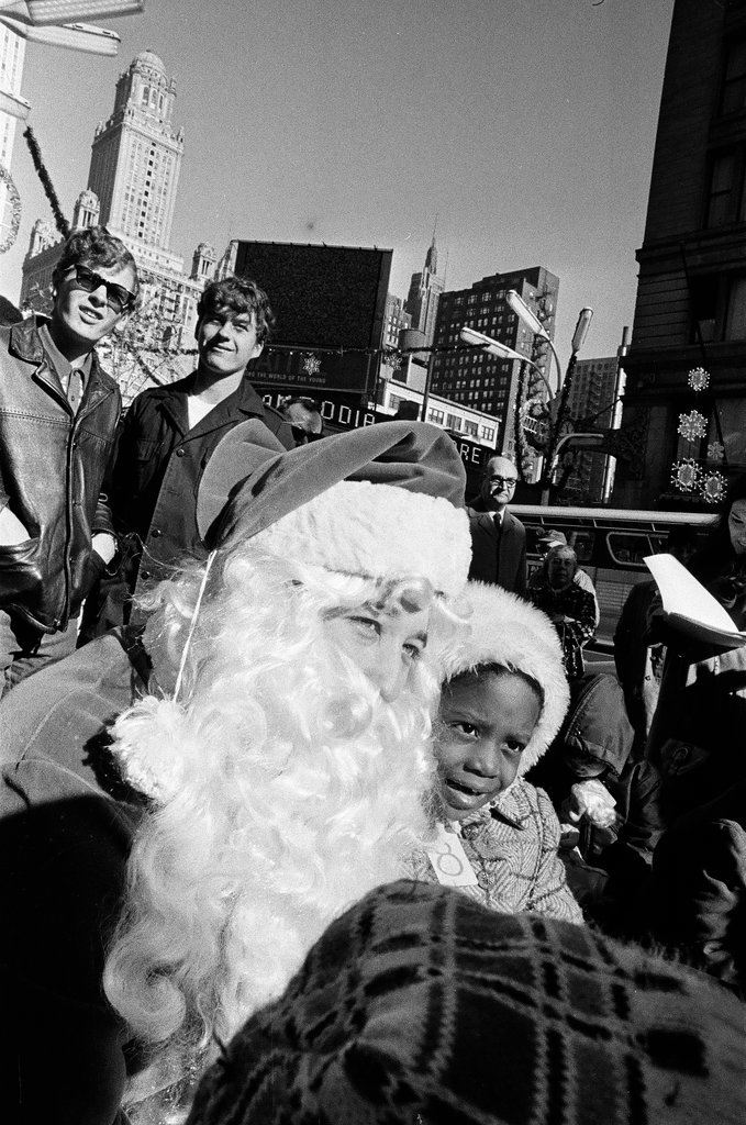 Monique Caldwell with Santa for Crusade of Mercy event - Charles Krejcsi for Chicago Sun-Times
