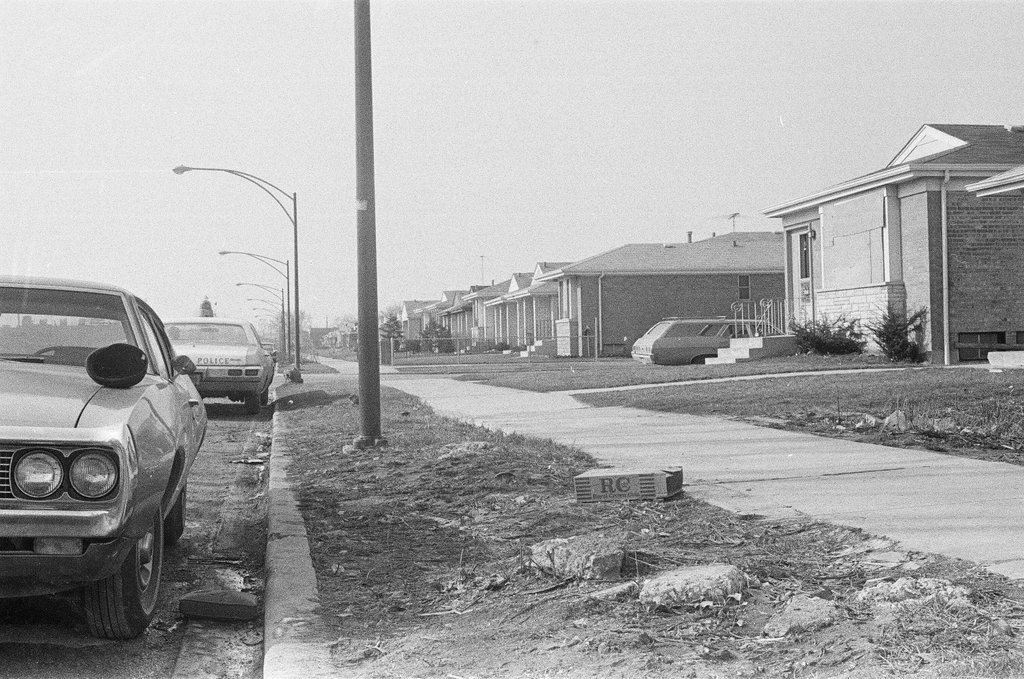 Guard shot at evicted homes - Charles Krejcsi for Chicago Sun-Times