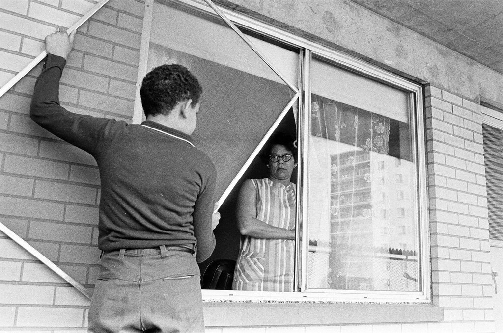 Window and door lock installation to prevent crime - Perry C. Riddle for Chicago Sun-Times