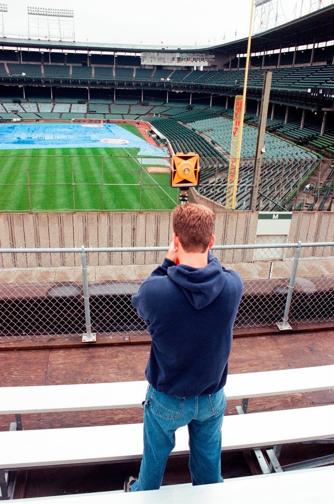 Surveyors measure Glenallen Hill's home runs at Wrigley Field - John H. White for Chicago Sun-Times