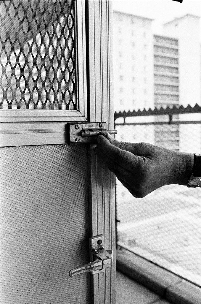 Window and door lock installation to prevent crime - Perry C. Riddle for Chicago Sun-Times