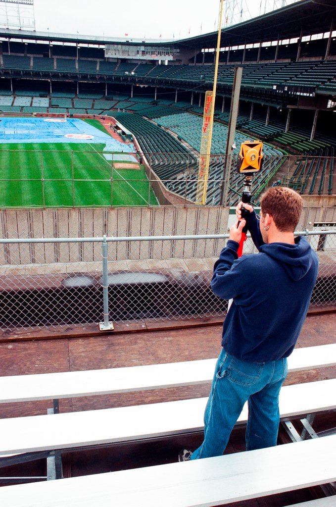 Surveyors measure Glenallen Hill's home runs at Wrigley Field - John H. White for Chicago Sun-Times