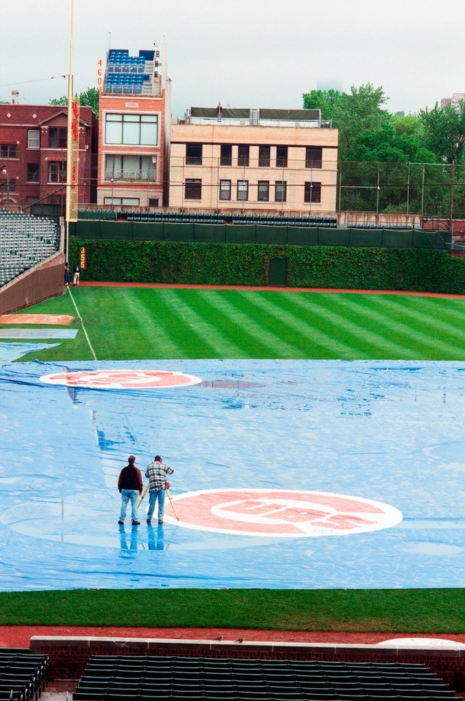 Surveyors measure Glenallen Hill's home runs at Wrigley Field - John H. White for Chicago Sun-Times