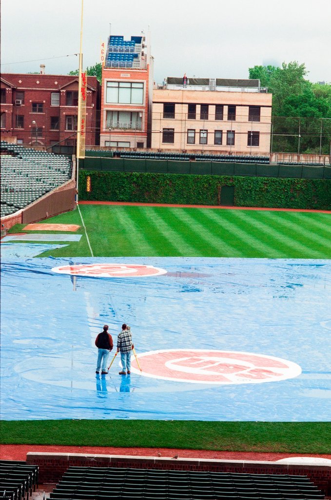 Surveyors measure Glenallen Hill's home runs at Wrigley Field - John H. White for Chicago Sun-Times