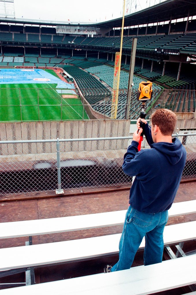 Surveyors measure Glenallen Hill's home runs at Wrigley Field - John H. White for Chicago Sun-Times