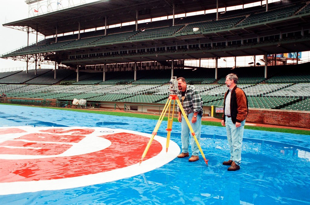 Surveyors measure Glenallen Hill's home runs at Wrigley Field - John H. White for Chicago Sun-Times