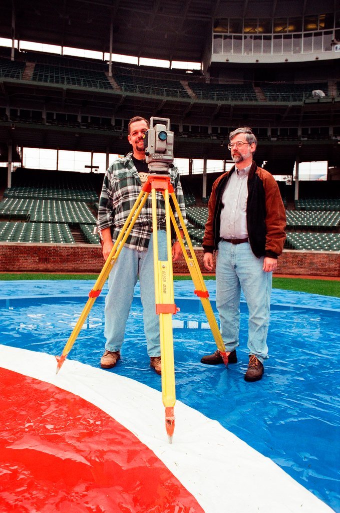 Surveyors measure Glenallen Hill's home runs at Wrigley Field - John H. White for Chicago Sun-Times