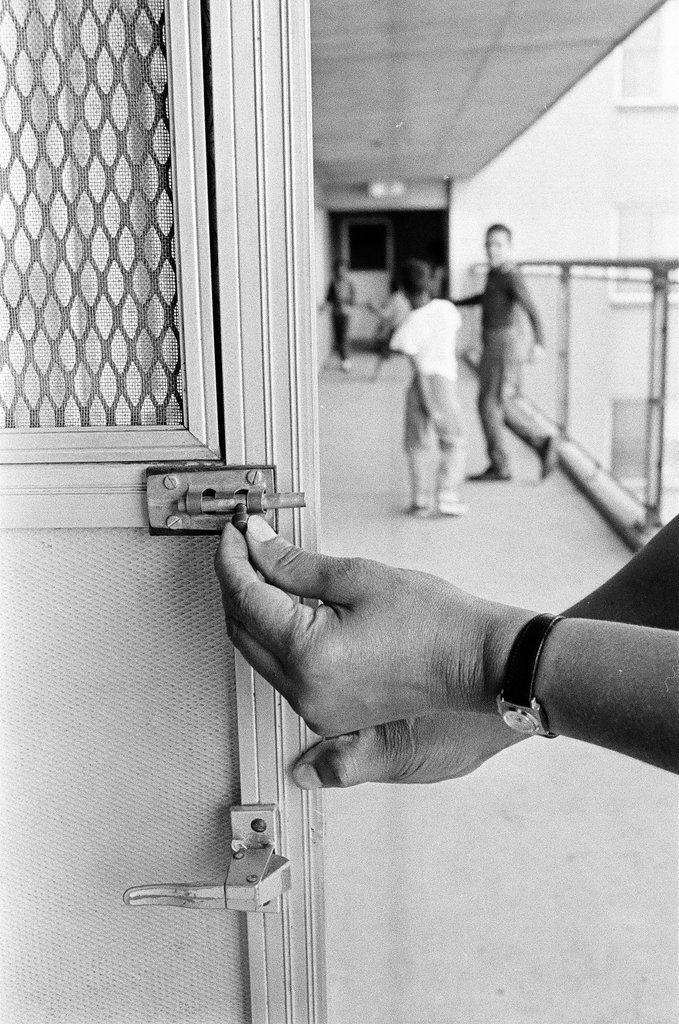Window and door lock installation to prevent crime - Perry C. Riddle for Chicago Sun-Times