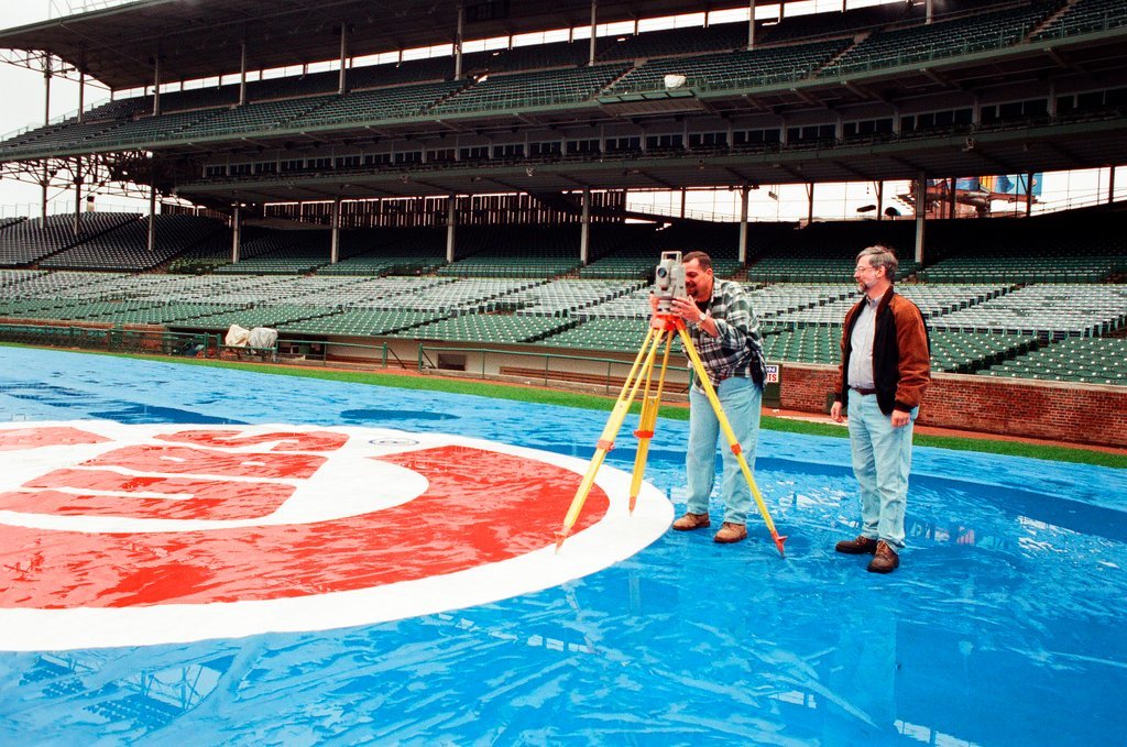 Surveyors measure Glenallen Hill's home runs at Wrigley Field - John H. White for Chicago Sun-Times