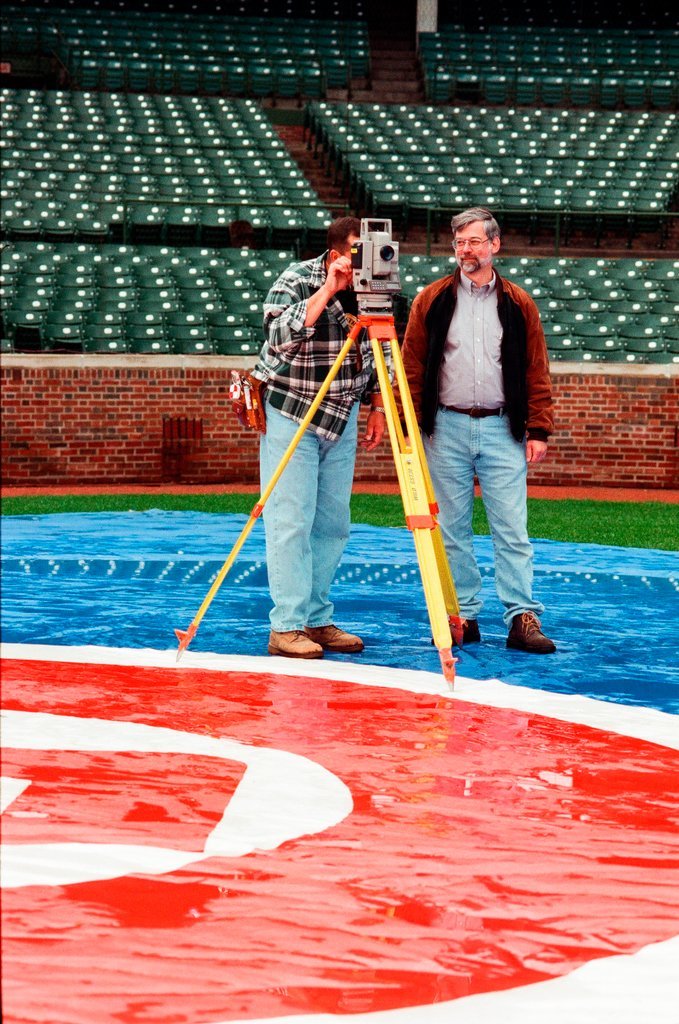 Surveyors measure Glenallen Hill's home runs at Wrigley Field - John H. White for Chicago Sun-Times