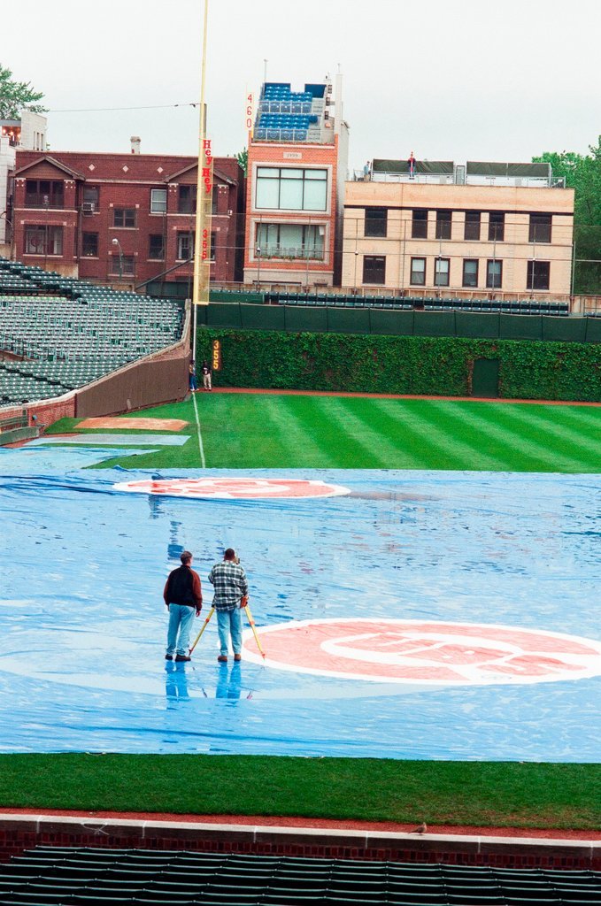 Surveyors measure Glenallen Hill's home runs at Wrigley Field - John H. White for Chicago Sun-Times