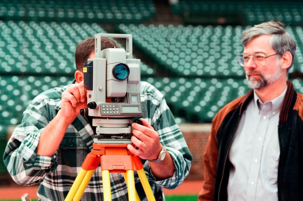 Surveyors measure Glenallen Hill's home runs at Wrigley Field - John H. White for Chicago Sun-Times
