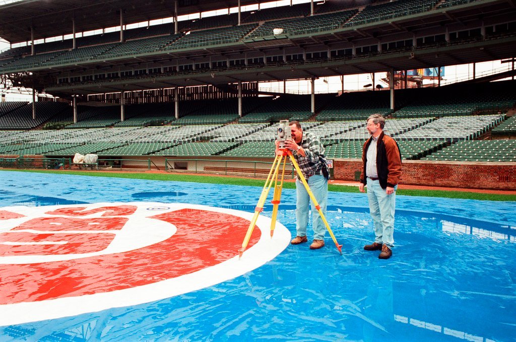 Surveyors measure Glenallen Hill's home runs at Wrigley Field - John H. White for Chicago Sun-Times