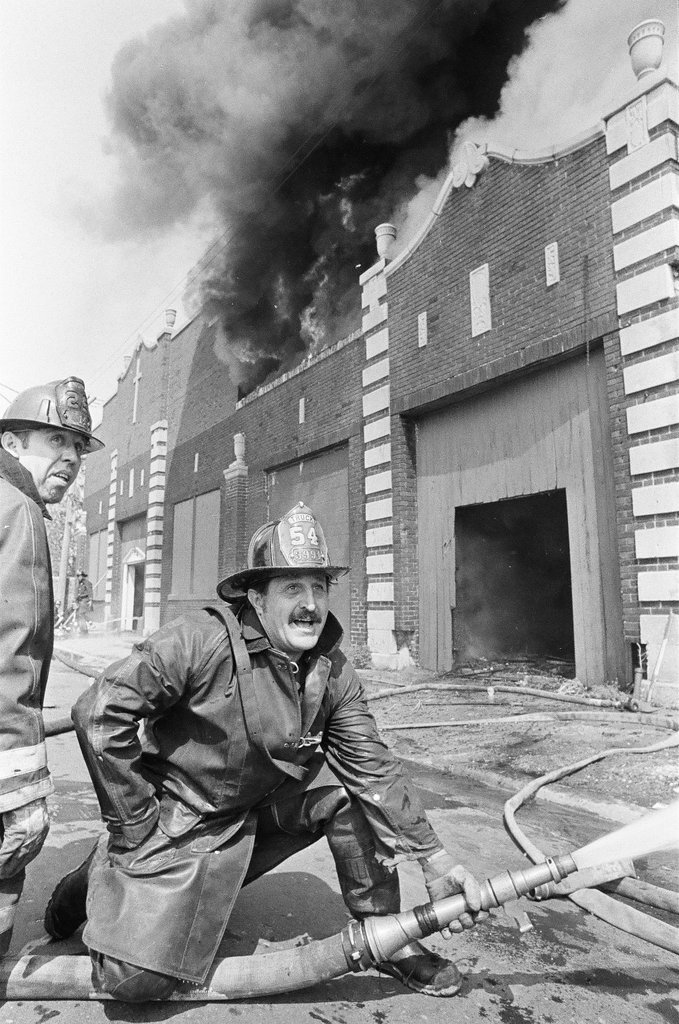 Firefighters fight a fire in Douglas - Jerry Tomaselli for Chicago Sun-Times