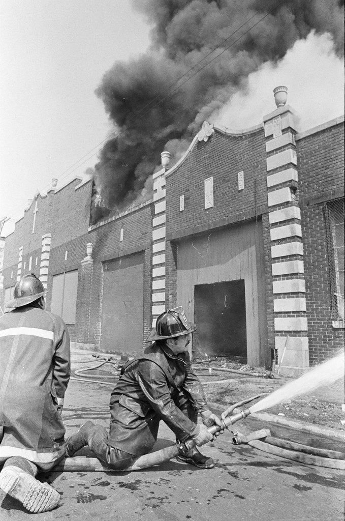 Firefighters fight a fire in Douglas - Jerry Tomaselli for Chicago Sun-Times