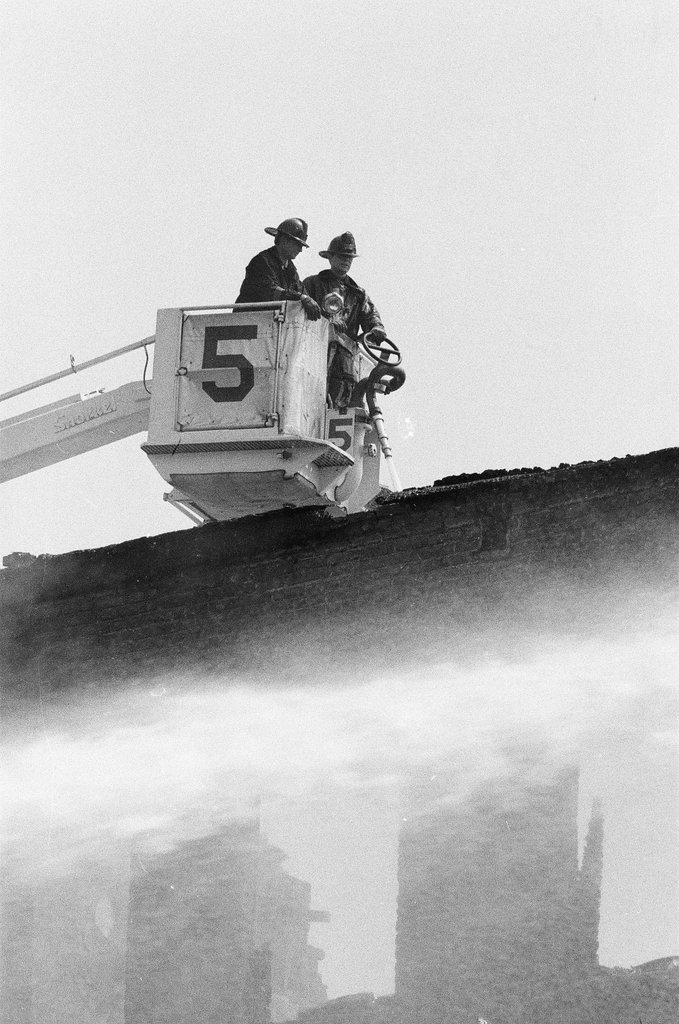 Firefighters fight a fire in Englewood - Jim Frost for Chicago Sun-Times