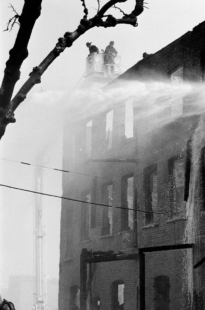 Firefighters fight a fire in Englewood - Jim Frost for Chicago Sun-Times