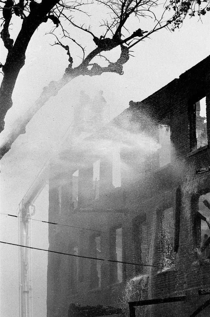 Firefighters fight a fire in Englewood - Jim Frost for Chicago Sun-Times