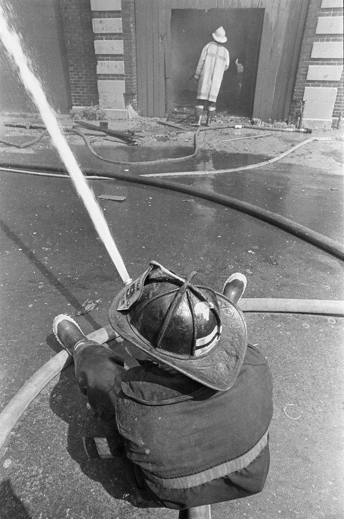 Firefighters fight a fire in Douglas - Jerry Tomaselli for Chicago Sun-Times