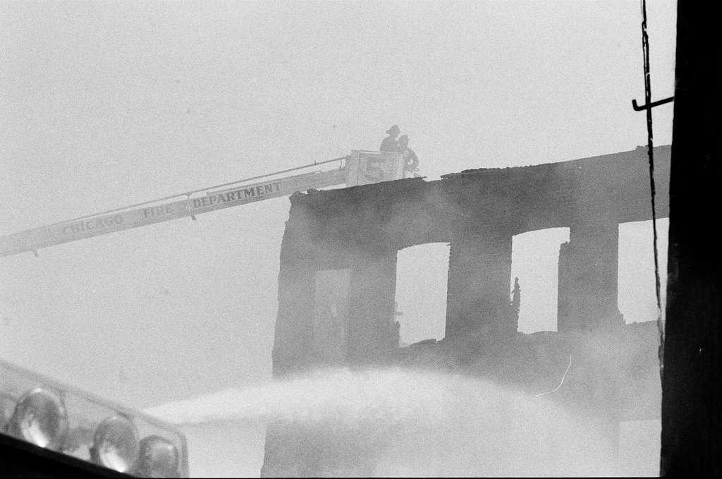 Firefighters fight a fire in Englewood - Jim Frost for Chicago Sun-Times