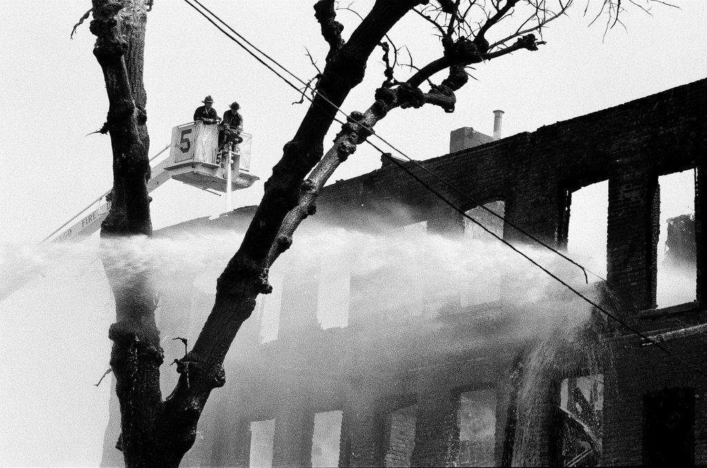 Firefighters fight a fire in Englewood - Jim Frost for Chicago Sun-Times