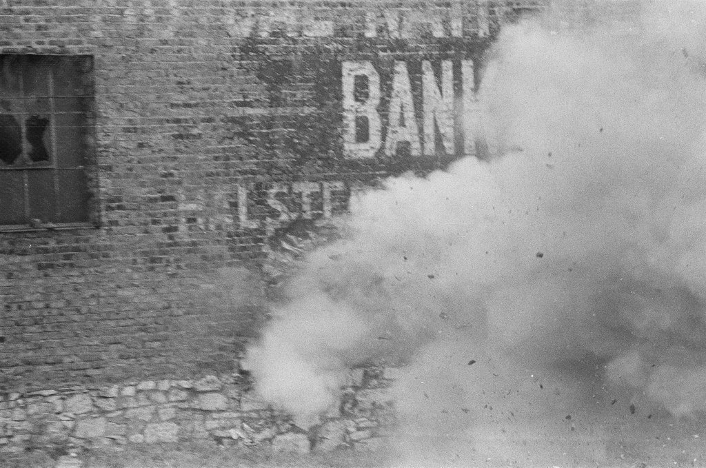 Firefighters knock out wall to access building - John Tweedle for Chicago Sun-Times