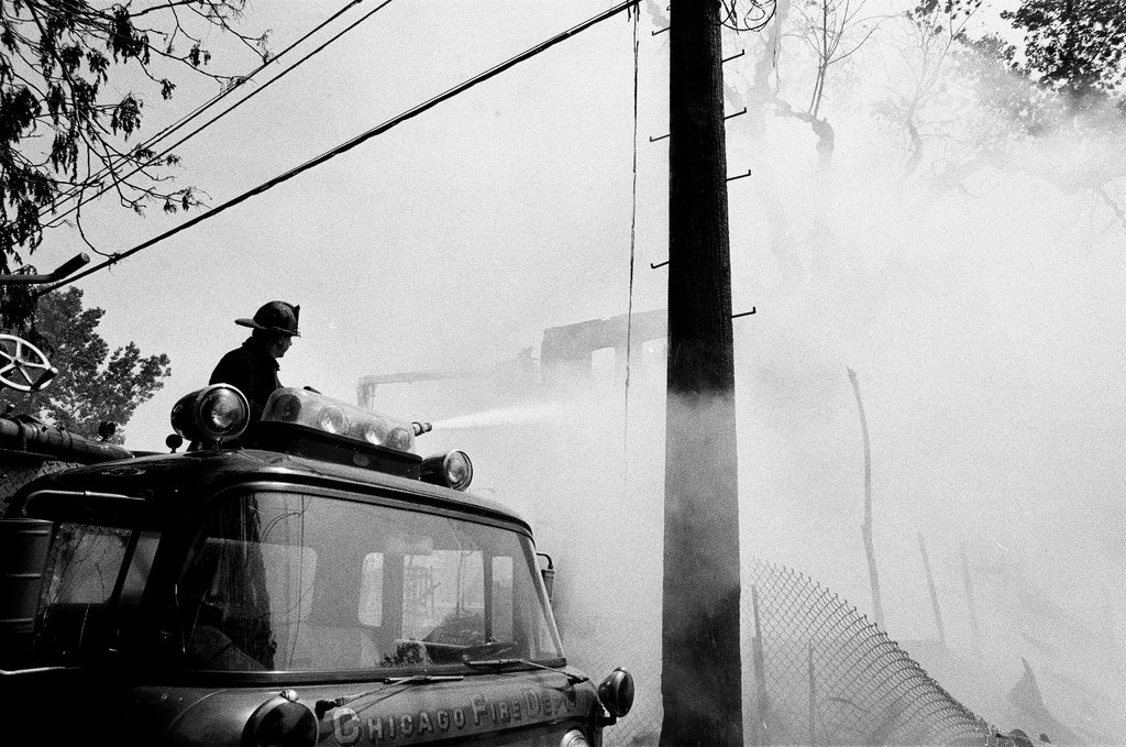 Firefighters fight a fire in Englewood - Jim Frost for Chicago Sun-Times