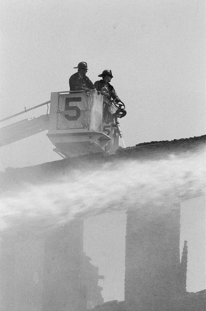 Firefighters fight a fire in Englewood - Jim Frost for Chicago Sun-Times