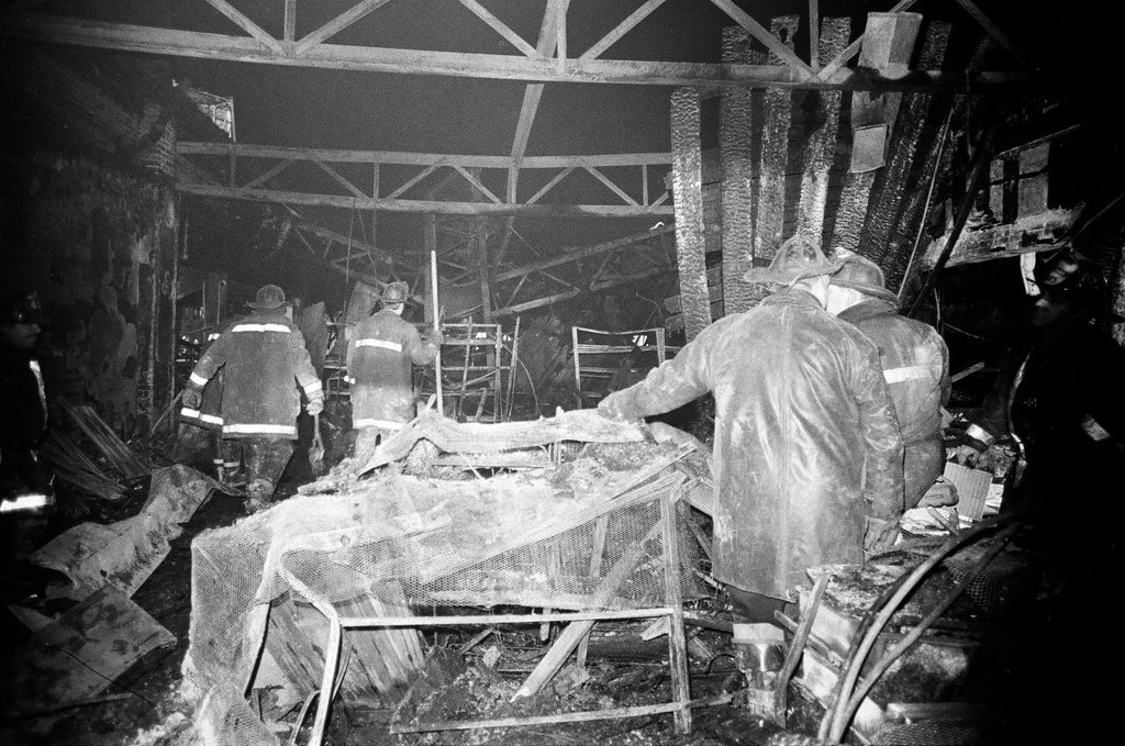 Firefighters assess fire damage in South Shore - Duane Hall for Chicago Sun-Times