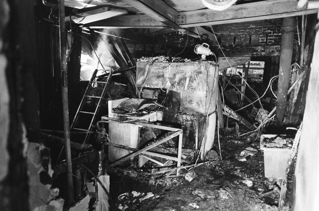Firefighters assess fire damage in South Shore - Duane Hall for Chicago Sun-Times