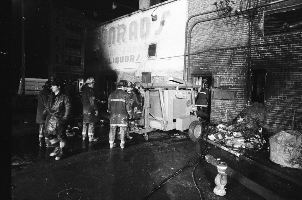 Firefighters assess fire damage in South Shore - Duane Hall for Chicago Sun-Times