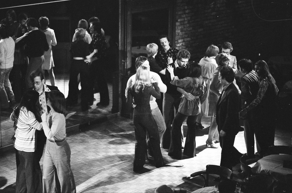 People dancing 'The Hustle' at a club - Don Bierman for Chicago Sun-Times