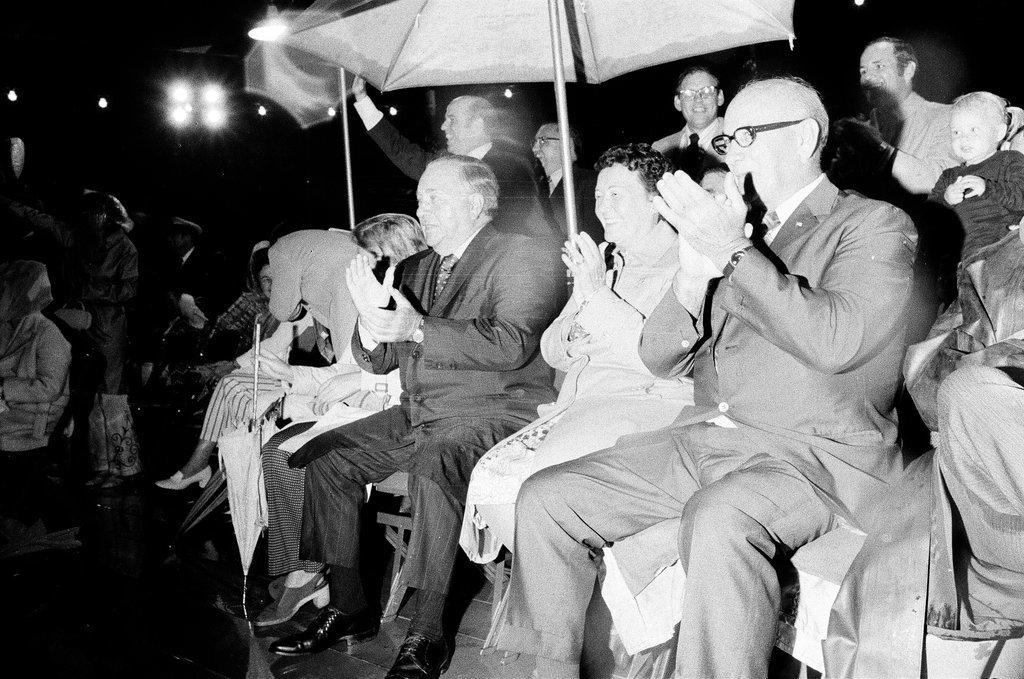 People watch Venetian Night under umbrellas - Chuck (Charles) Kirman for Chicago Sun-Times