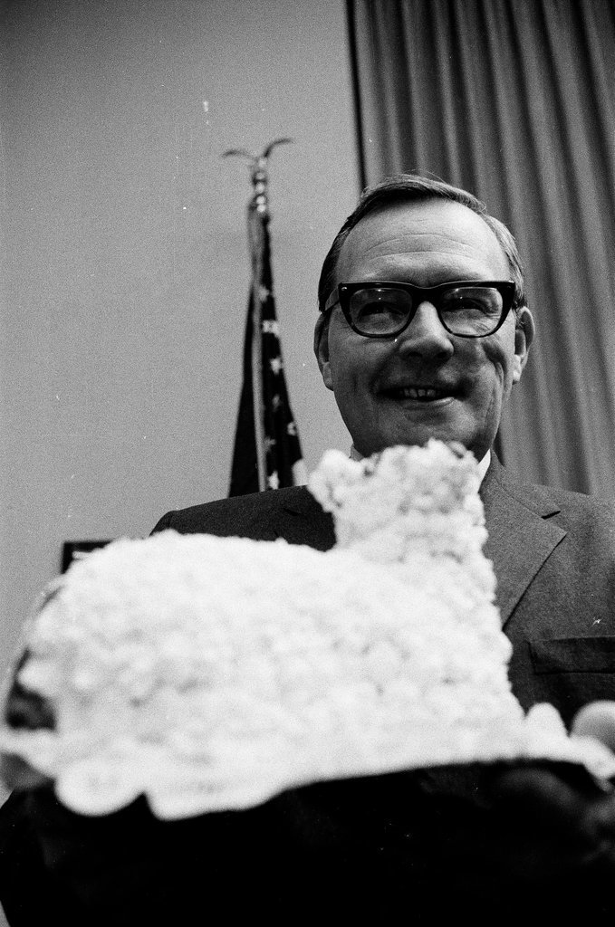 Governor Ogilvie tastes cake frosting - Larry Graff for Chicago Sun-Times