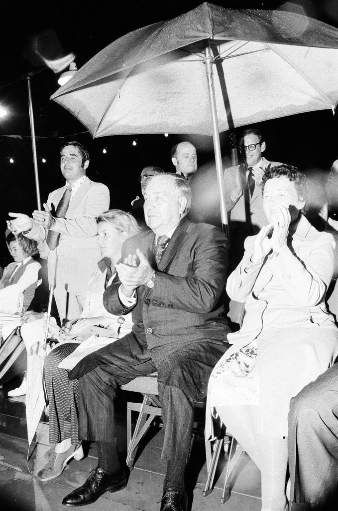 People watch Venetian Night under umbrellas - Chuck (Charles) Kirman for Chicago Sun-Times