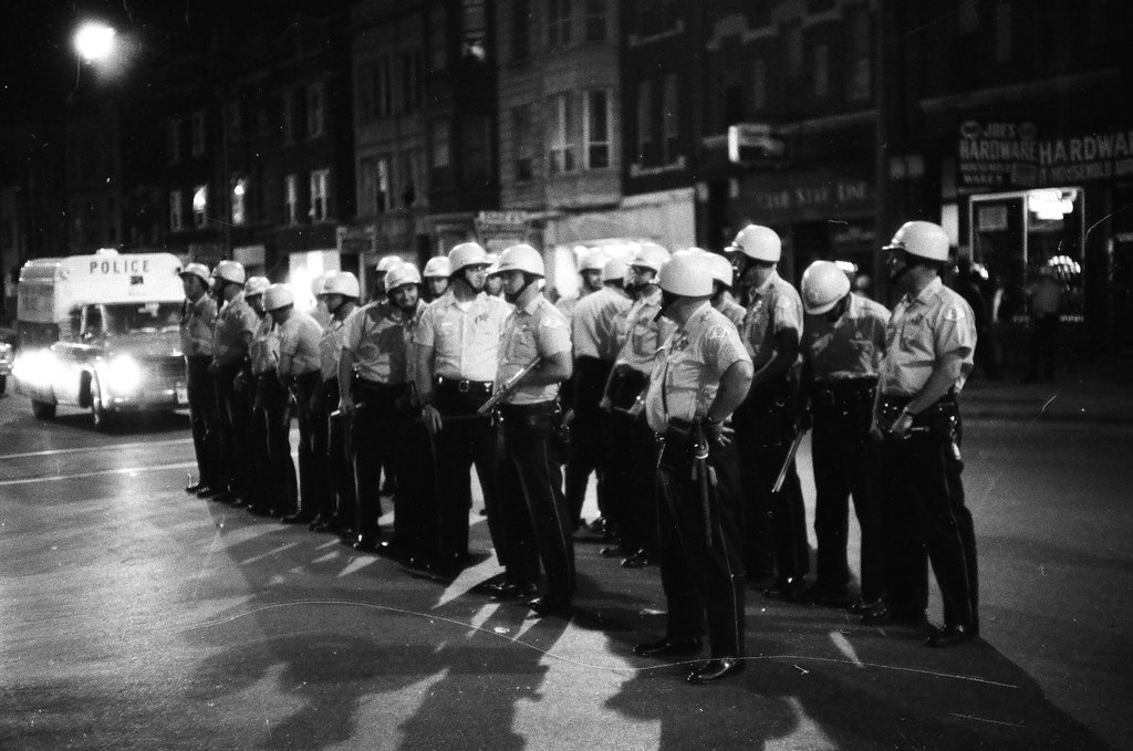 Police patrol during Division Street uprising - Chicago Sun-Times