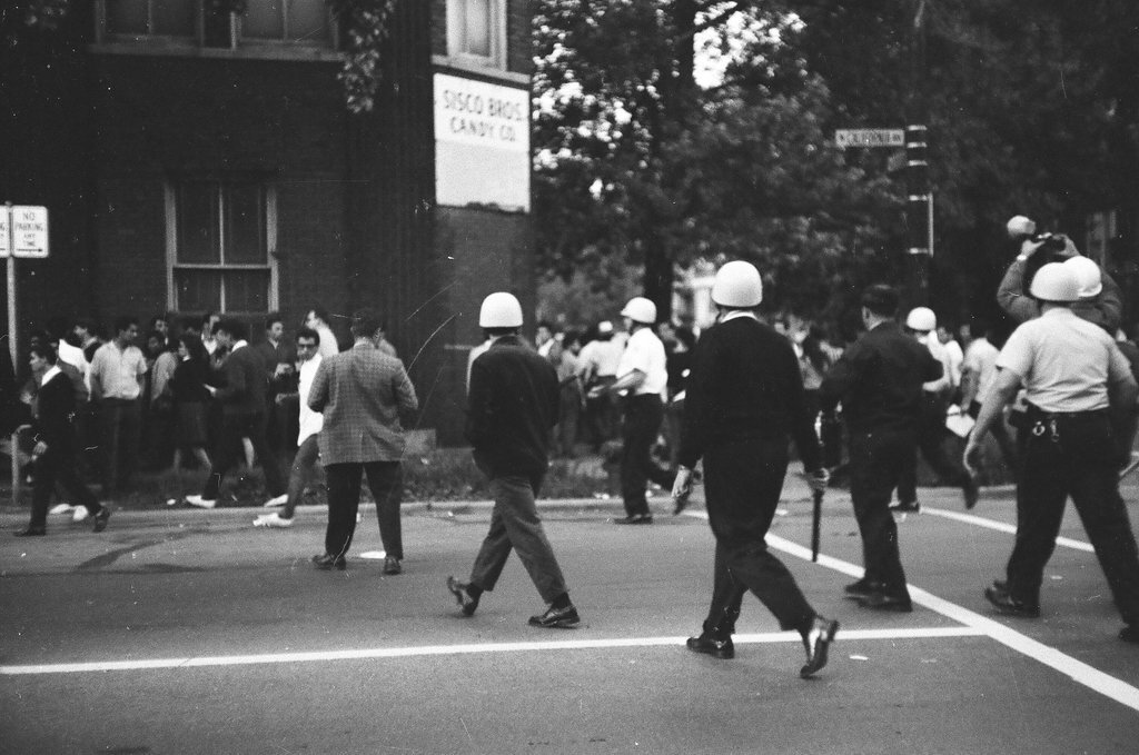 Police patrol during Division Street uprising - Chicago Sun-Times