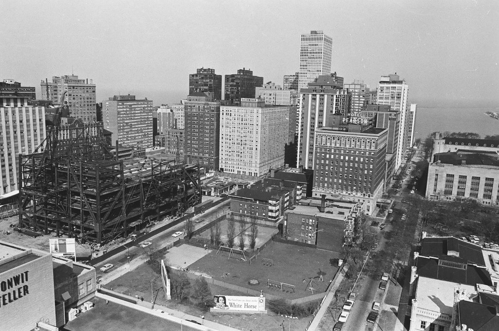 Aerial view of water tower and skyscraper construction - Bob Langer for Chicago Sun-Times
