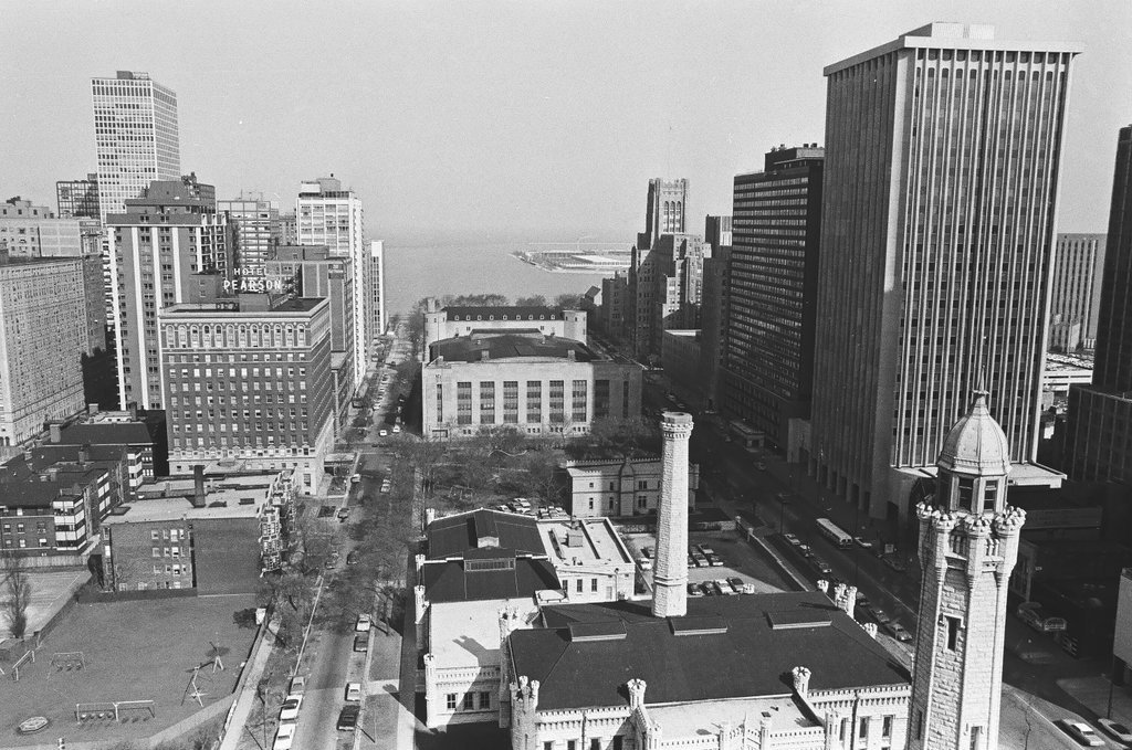 Aerial view of water tower and skyscraper construction - Bob Langer for Chicago Sun-Times